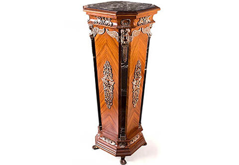 French 19th century Empire style distressed Ormolu-mounted inset marble topped light sans traverse palisander veneer inlaid Pedestal stand, the square veined black marble top with canted corners, over a conforming tapered base with further veined black marble columns headed with fine chiseled exquisite typical Empire style ormolu winged female bust capitals, with Neoclassical-style mounts throughout, raised on four ormolu feet-form supports
